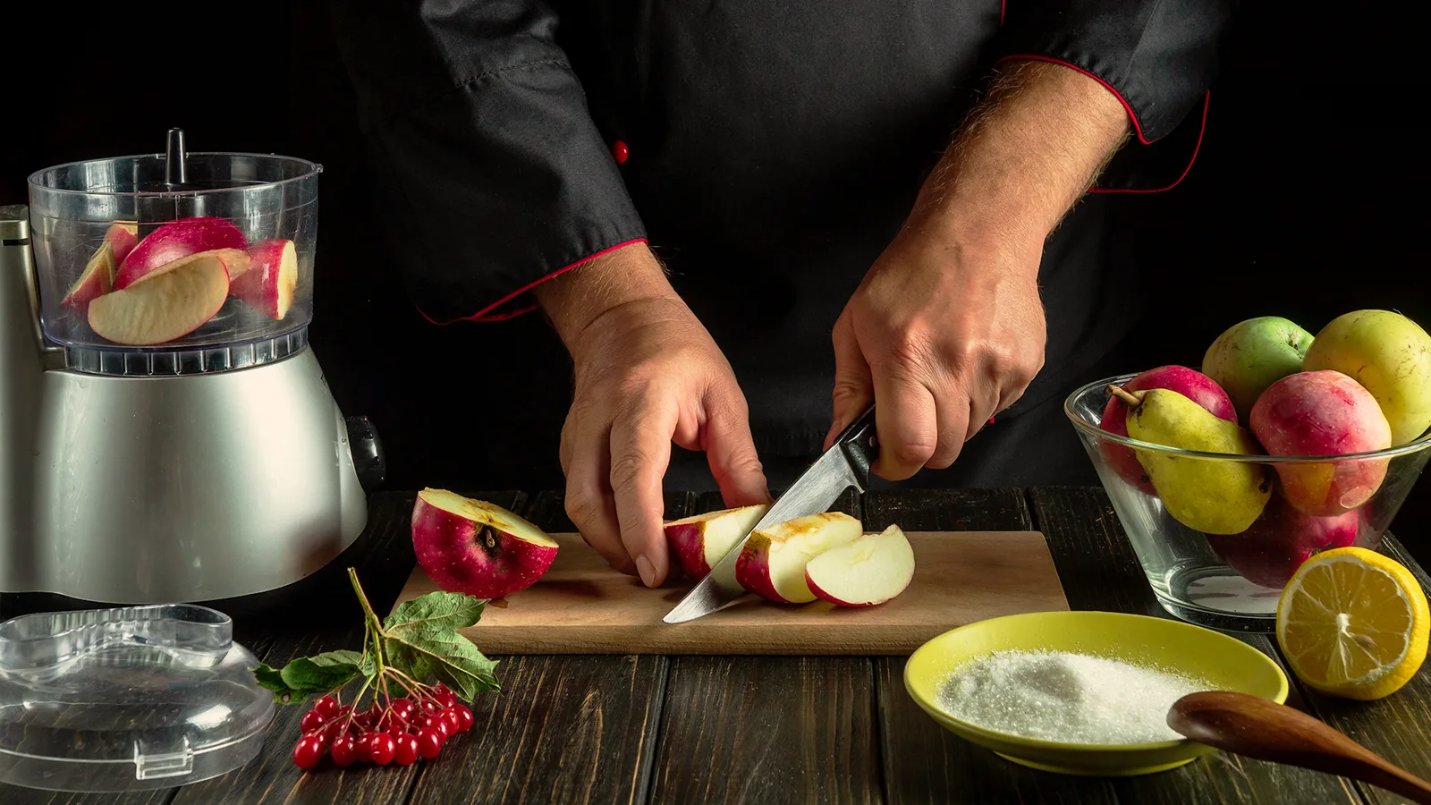 A chef preparing fresh fruit